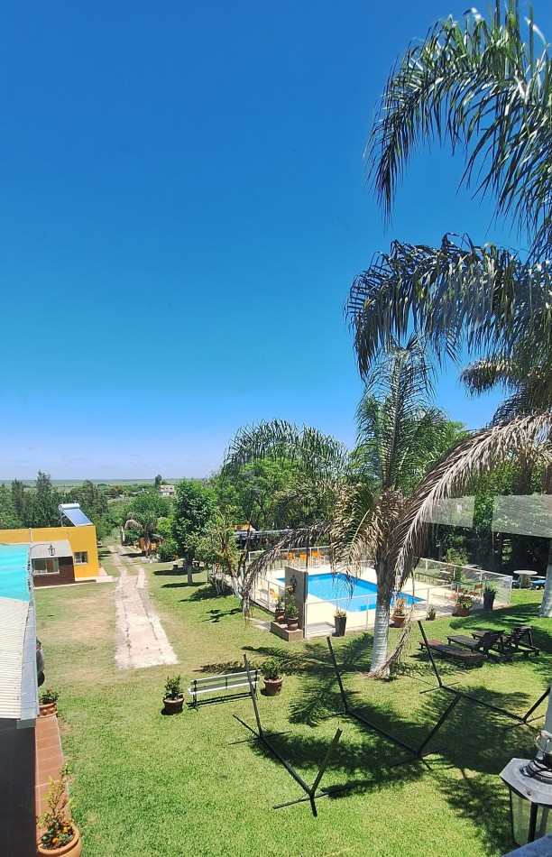 Venta importante complejo de cabañas, zona Abadia. Vistas al rio