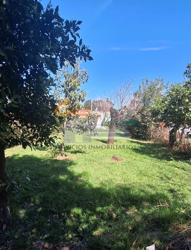 VENTA, casa dos dormitorios, living cocina, MUY AMPLIO PATIO espacio verde